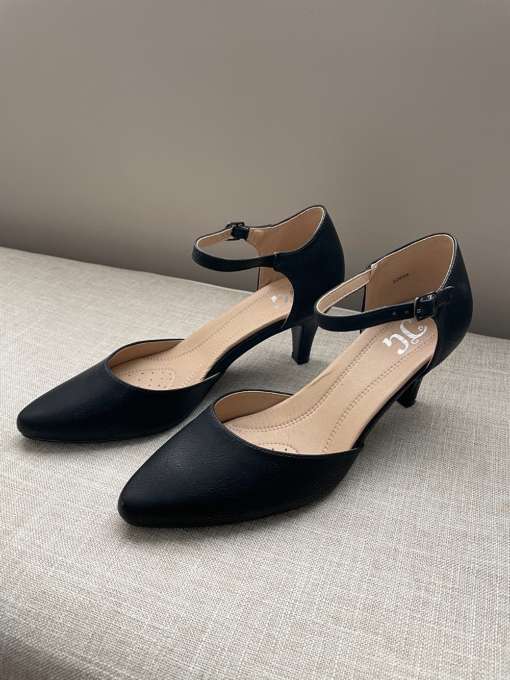 Black pumps with ankle strap by Journee
